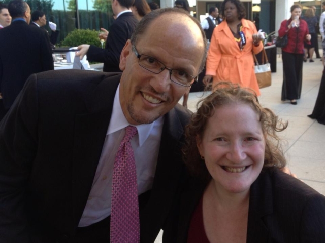 Tom Perez and Rhonda smiling at camera.