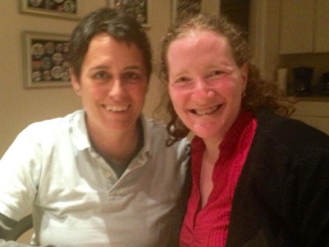 Rhonda with former candidate for Maryland Governmor, together reviewing a draft disability policy. Both smiling at camera.