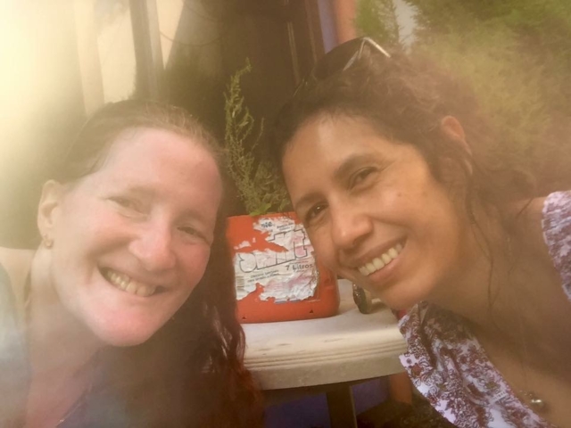 Two colleagues similing at the camera in Guatemala.