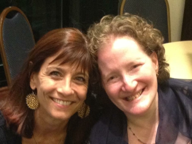 With colleague smiling at Disability Innaugural Ball