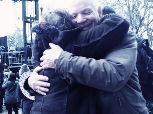 Rhonda hugging Maryland Senator Cardin. Senator Cardin smiling.