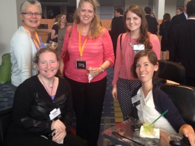 Rhonda with colleagues in disability rights at gala.