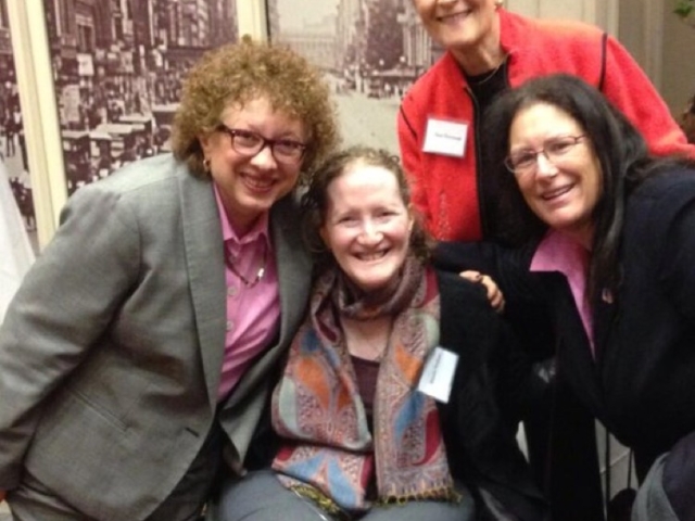 Rhonda with colleagues at community event.