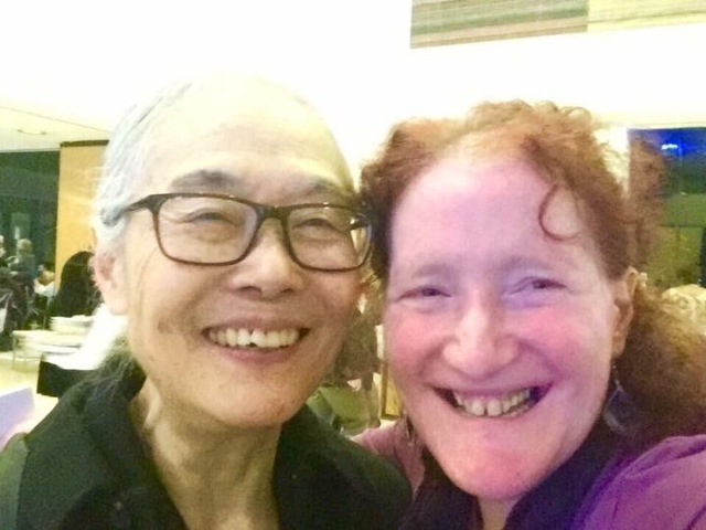 Yoshiko Dart and Rhonda smiling at the camera.