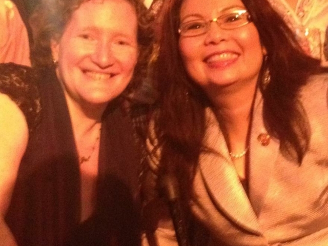 Senator Tammy Duckworth and Rhonda smiling at the Disability Inauguration, 2012.