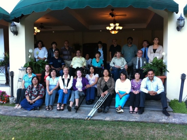 A large group of people with and without disabilities in El Salvador for a training.
