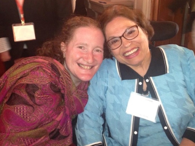 Rhonda with mentor Judy Heumann, smiling.