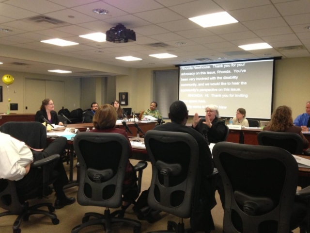 Rhonda Presenting testimony on behalf of DREDF at an National Council on Disability board meeting.