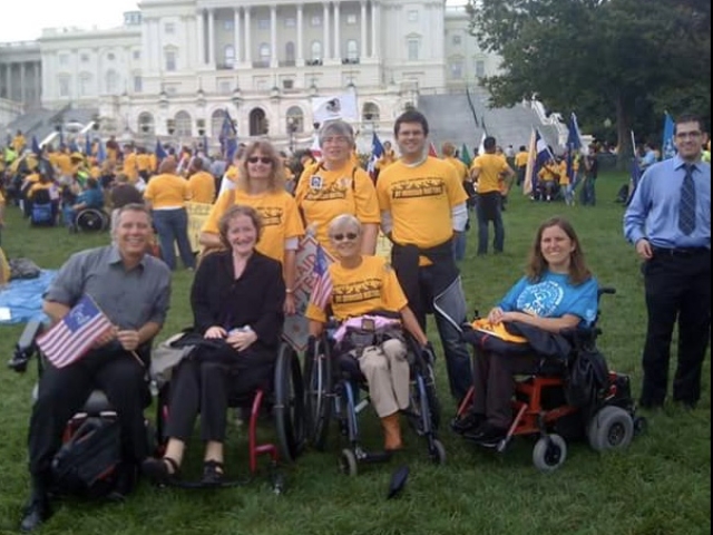 Group of disability advocates in front of the U.S. Capitol.