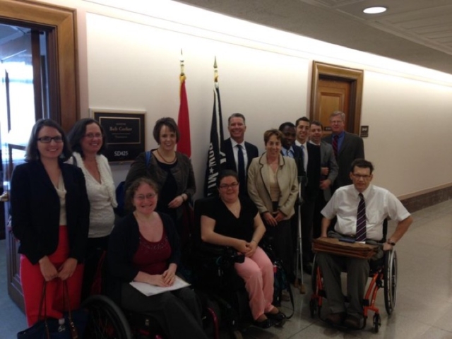 A large group of disability advocates following a meeting with a Senate office on CRPD.