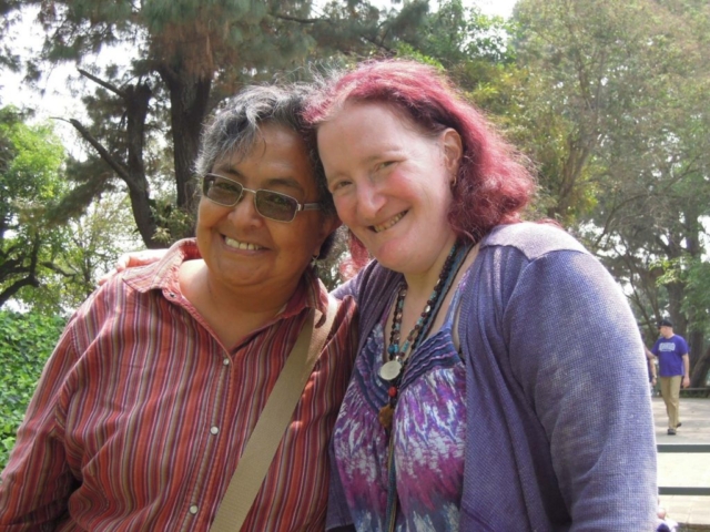 Guatemalan advocate and Rhonda embracing and smiling at the camera.