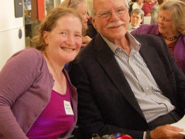 Rhonda with Congressman Miller, disability rights supporter, at DREDF event. Both smiling at camera.