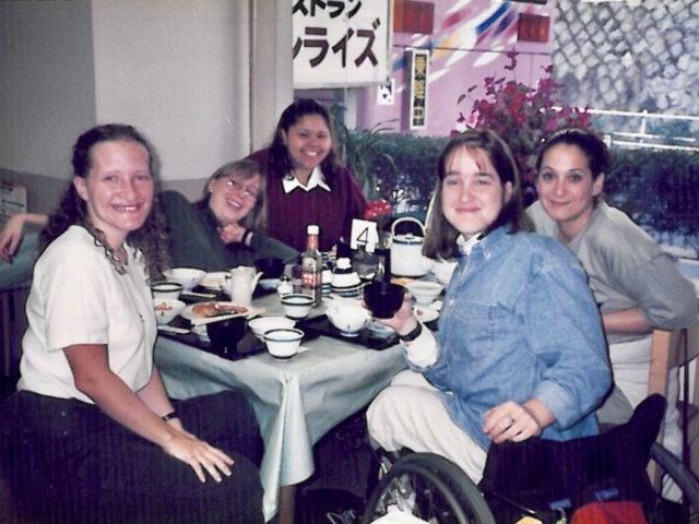 Rhonda with colleagues with disabilities (over a meal) on a MIUSA professional delegation to Japan, 1998