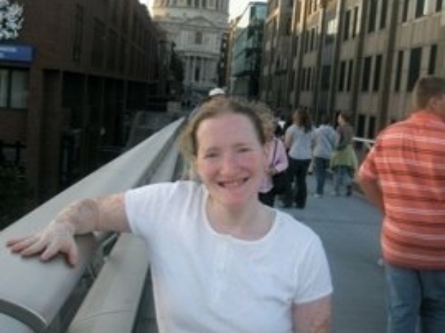 Rhonda standing in London with Big Ben in the distance.