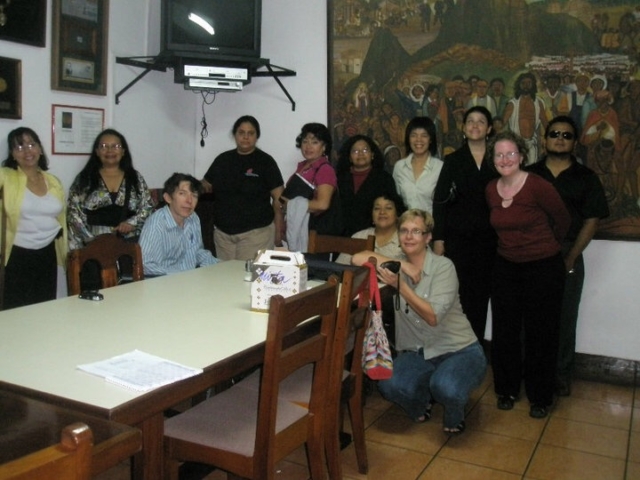 12 people gathered for photo following planning sessions and training for Making it Work projects.