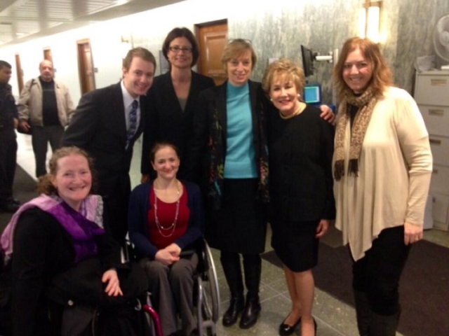 Rhonda in the Senate with Senator Elizabeth Dole and disability rights colleagues.