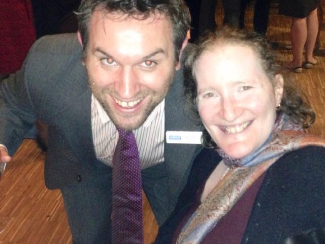 Rhonda with HI colleague smiling at camera at event