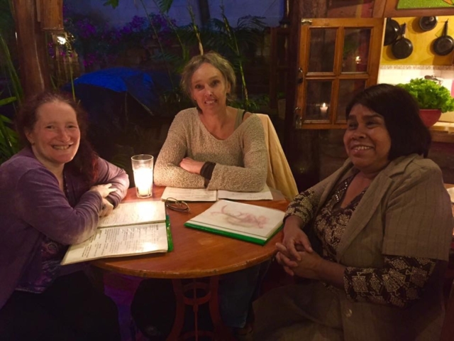 3 smiling colleagues from the United States, Guatemala and Holland - in Guatemala.